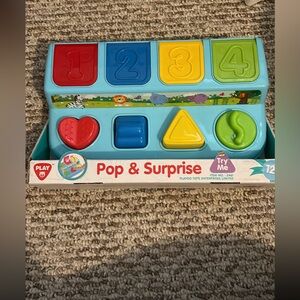 Pop & Surprise Shape Sorter – Blue with Red, Yellow, Green Accents